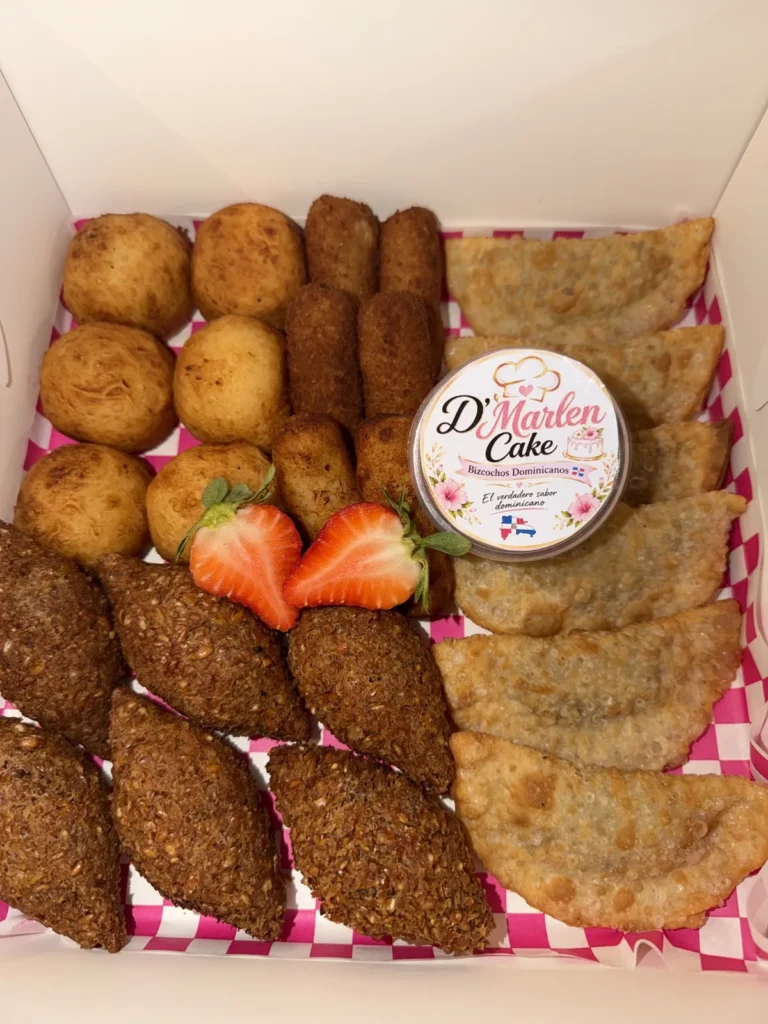 Box of Dominican picaderas: kipes, croquetas and pastelitos