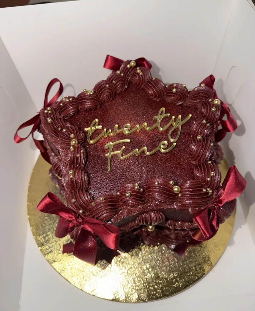Red heart shaped vintage cake reading Twenty Five